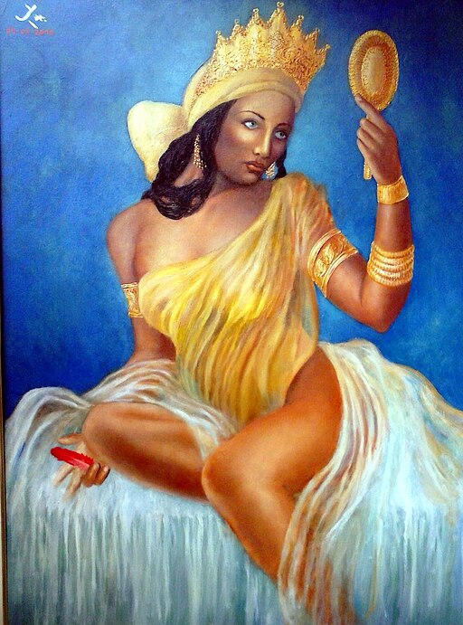 Oshun Goddess of Yoruba religion. Goddess sitting in yellow dress staring at herself in the mirror. 