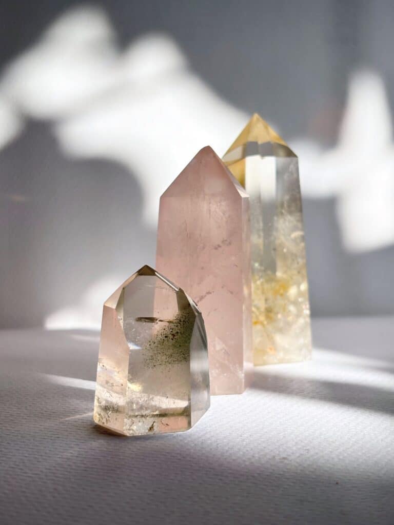 Crystal Towers. Clear quartz with green inclusion. Rose Quartz tower and Clear Citrine Tower.